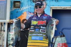 Pro winner Randall Tharp holds up part of his 23-pound, 2-ounce final-day stringer.