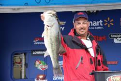 Co-angler leader David Alfonso caught the heaviest bass of the first day, a 9-1.