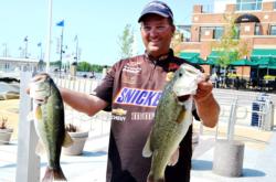Snicker pros Chris Baumgardner of Gastonia, N.C., finished the first day of FLW Tour competition on the Potomac River tied for second place with a catch of 18 pounds, 4 ounces.