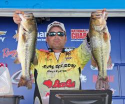 Fourth-place David Harvey ducked into a creek arm when the storm passed through and continued catching fish.