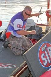 Fourth-place pro Joe Thompson loads his rods in preparation for the final round of Lake Champlain competition.