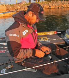 New Jersey pro Mike Iaconelli rigs up a dropshot prior to the day-one launch.