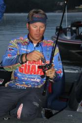 Defending Forrest Wood Cup champion Scott Martin rigs up a jigging spoon prior to takeoff.