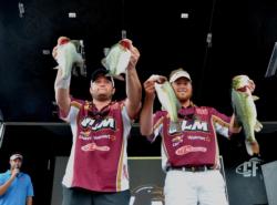 Paul Clark and Brett Preuett of the University of Lousiana-Monroe hold up their 15-pound, 15-ounce limit to sit them in fourth with 27-7 as a total. 