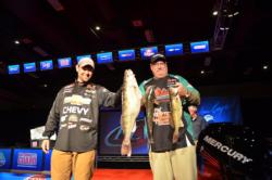 Co-angler Stuart Lubbert of Stewart, Minn., takes the overall lead after a massive day-two weight of 15 pounds, 4 ounces. 