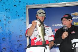 Austin Terry pulls out one of his winning fish.