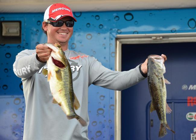 Pro leader Drew Benton holds up part of his 15-pound, 3-ounce limit from day three on Lake Okeechobee.