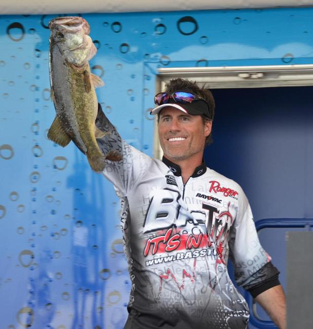 Fourth-place pro Wade Hendricks holds up his biggest bass from the final day of competition on Lake Okeechobee.