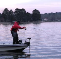 Jacob Powroznik fights a spotted bass around the boat.
