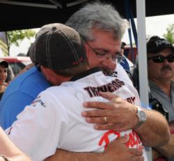 A proud Papa: Peter T hugs his son Nick Thliveros after he wins the EverStart Series event on Wheeler Lake.