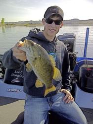 University of Wyoming student Tyler Stingley holds up a nice smallmouth.