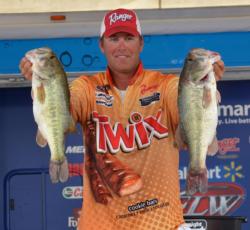 Pro leader Randy Haynes shows off part of his 22-pound, 2-ounce stringer from day three on Lake Eufaula.