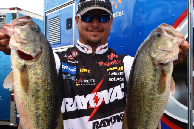 Rayovac team pro Jason Christie of Park Hill, Okla., used a 21-pound, 12-ounce catch to grab the overall lead during the first day of FLW Tour action on Grand Lake.