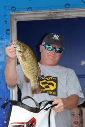 Scott Shafer shows off one of his nice smallmouth on day three. 