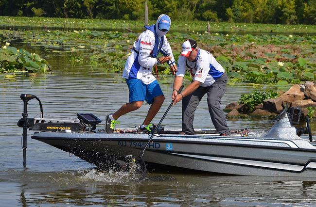 Adrian Avena fights a Red River largemouth to the boat. 