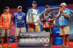 Flanked by Kellogg's team pros Shinichi Fukae (far left), Greg Bohannan (2nd from left), Jim Tutt (far right) and Dave Lefebre (2nd  from right), Andy Morgan displays his 2013 FLW Tour Angler of the Year hardware.