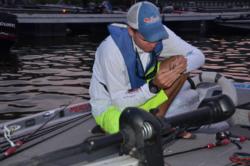 EverStart pro Adrian Avena checks his tackle before the start of takeoff.