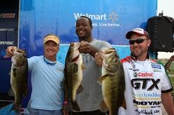 Castrol team pro David Dudley and his team proudly show off their catch during the inaugural Channing Crowder Charity Bass Tournament.
