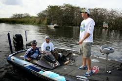 Keystone Light team pro Chad Grigsby prepares to depart the marina with his team during the inaugural Channing Crowder Charity Bass Tournament.