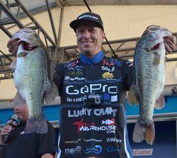 Brent Ehrler shows off his day-two Lake Okeechobee catch weighing 23 pounds, 11 ounces. 