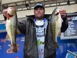 Clent Davis used a mix of largemouths and spotted bass to finish day one seventh with 16-14.