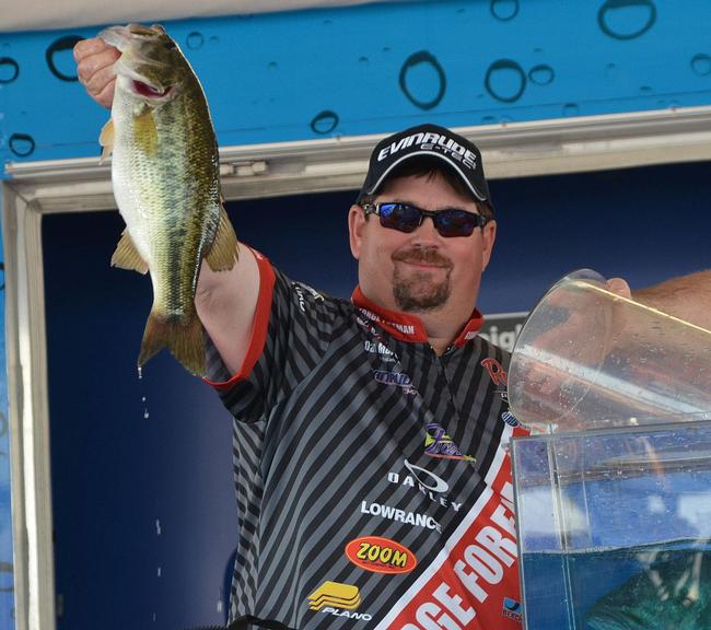 Eighth-place finisher Dan Morehead holds up his biggest bass from day four on Lake Hartwell. 