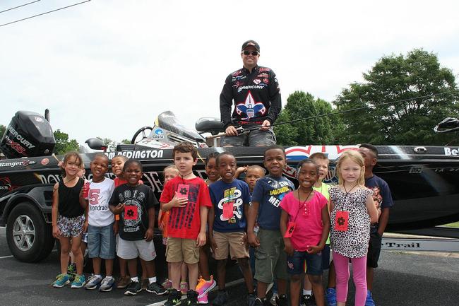 Boy Scouts pro Tom Redington poses with some of the students he mentored this week.