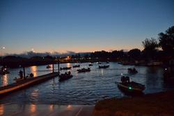 Anglers gather at the Clinton Street Landing for day one of the Rayovac FLW Series Central Division event on the Mississippi River.