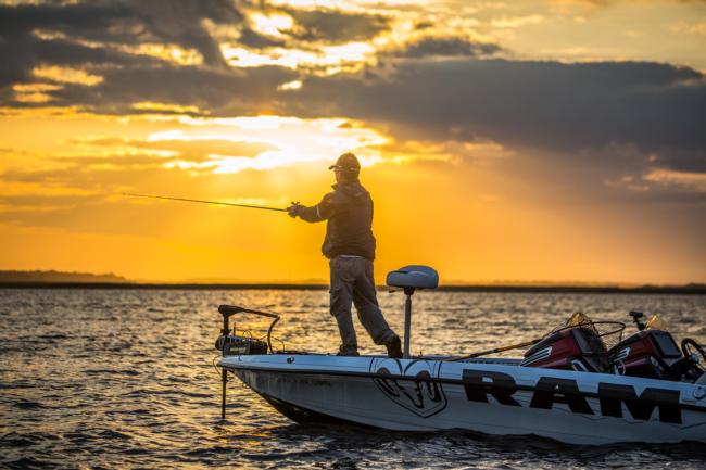 Eighth place pro Troy Morrow casts on Toho as the Florida sun rises over the lake. 