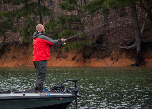 Pro Jason Johnson makes an early morning cast on day one of the FLW Tour on Lewis Smith Lake hoping the lunker is there waiting.