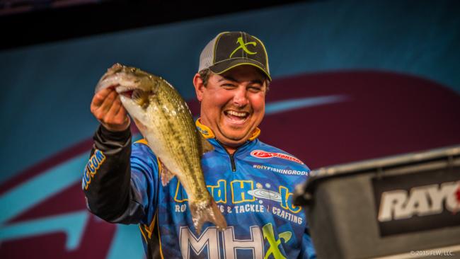 John Cox is nothing but smiles on day three of the Walmart FLW Tour. He weighed 12-13, the heaviest sack of the day, to make the top 10 cut in fourth place. He will be the one to watch tomorrow.