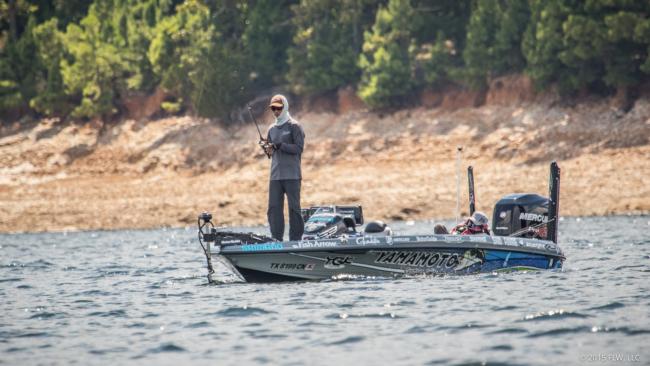 Hey! We found Shin Fukae. Shin was using spinning tackle and targeting what looked like was an offshore brush pile. We will see lots of anglers probing the depths of Lake Ouachita for a limit of bass this week. If you look closely you can also see Shin's wife, Miyu, sleeping in the passenger seat. ?