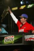 Katsutoshi Furusawa weighs in the kicker bass that helped him win the 2004 FLW co-angler contest at Old Hickory Lake.