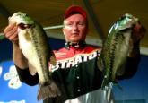 Stratos pro Craig Powers of Rockwood, Tenn., put himself in good position to claim the $1.25 million Wal-Mart Open's top prize of $200,000 cash thanks to a five-bass catch Thursday that weighed 13 pounds. His two-day total of 10 bass weighing 27 pounds, 9 ounces leads the 10 pros who will compete Friday and Saturday for one of the Wal-Mart FLW Tour's most lucrative awards