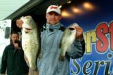 Brian Mlekush of Rancho Cucamonga leads the 10 co-anglers who advanced to Saturday's competition with a five-bass catch Friday that weighed 21 pounds, 11 ounces. The bass on the left weighed 9 pounds, 8 ounces by itself.