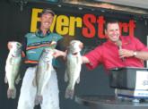 Pro Andy Morgan of Dayton, Tenn., brought in a whopping 26 pounds today. EverStart Tournament Director Chris Jones helps Morgan hold up his catch. These three bass alone weighed 22 pounds. Morgan is in second with a two-day total of 37 pounds, 15 ounces.