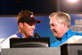 Pro Tim Klinger smiles alongside FLW weigh-in host Chralie Evans as he recounts what he did with his winnings from the tour's last tourney, the Wal-Mart Open.