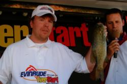 Peter Cherkas of Des Moines, Iowa, proudly holds up his catch. Cherkas finished in second place overall in the Co-angler Division by a mere 3 ounces.