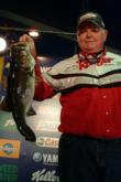 Pro Billy Bowen Jr. of Ocala, Fla., shows off part of a 9-pound, 13-ounce catch at a recent FLW Tour stop.