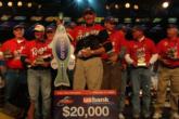 The top-10 co-anglers acknowledge the crowd shortly after the conclusion of the day's weigh-in.