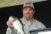 David Curtis weighs in one of his bass on day four of the EverStart Central opener.