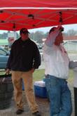 The final two anglers, Matthew Mize and Dick Shaffer, wait for their turn to weigh in.
