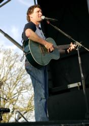 Country star Craig Morgan sings for the Wal-Mart Open audience during a free April 15 concert in Rogers, Ark.