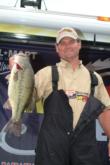 Brett Pinion of Webb City, Mo., with his 6-pound, 1-ounce bass that put him in second place on day three.
