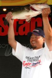 Pro Thanh Le of El Cajon, Calif., shows off his 9-pound, 8-ounce largemouth en route to a fourth-place finish at the California Delta event.