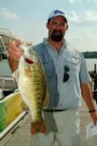 Co-angler Bill Gift caught this rare 4-pound, 11-ounce meanmouth bass in competition Thursday.