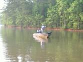Pro Craig Powers of Rockwood, Tenn., catches an early keeper on a topwater plug.