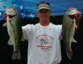 No. 5 pro Shawn Penn poses with a pair of Kentucky Lake bass.