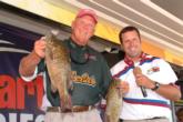 Pro David Smith of Del City, Okla., in third with a two-day total of 35 pounds, 15 ounces, poses with Tournament Director Chris Jones.