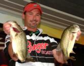 Derek Moyer of Alexandria, Va., caught five bass weighing 11 pounds 12 ounces to lead the Co-angler Division Friday.